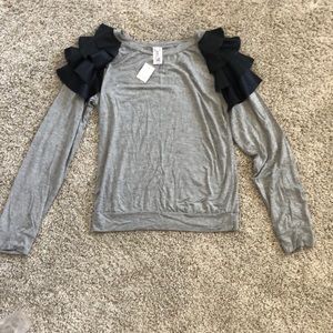 NWT fun shirt with ruffles on shoulders